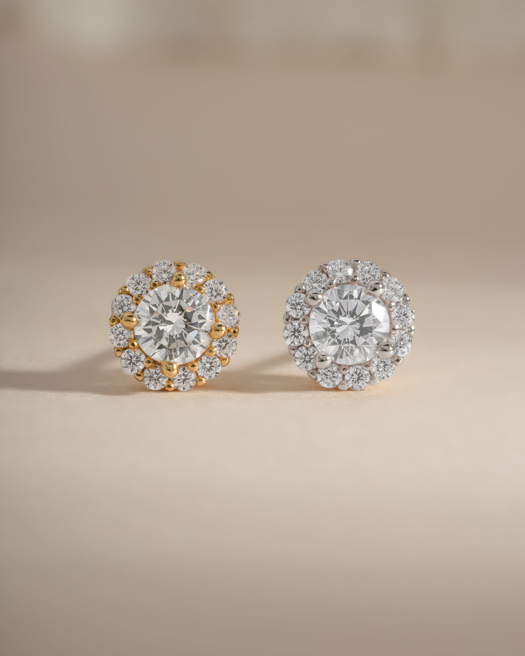 Sami Jewels diamond halo stud earrings with sterling silver and gold, featuring sparkling diamonds in a circular halo design.