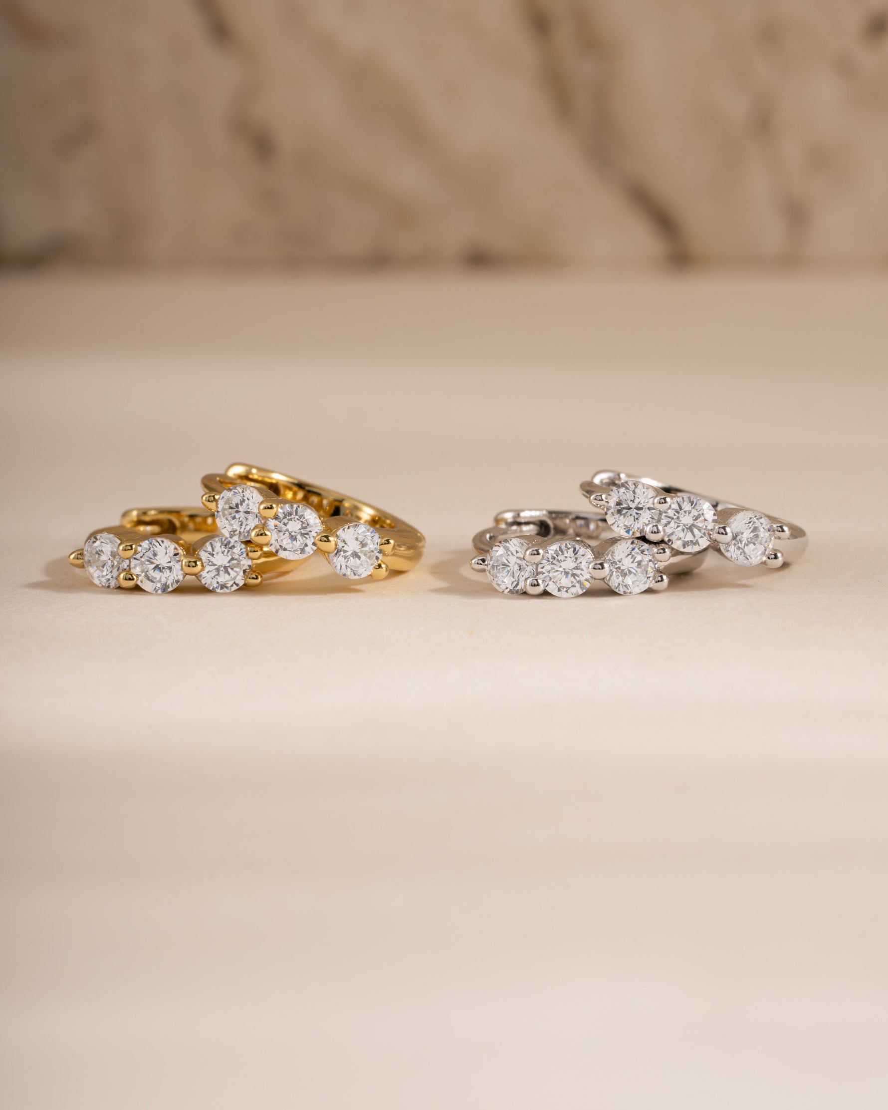 8mm gold and sterling silver diamond-studded Stacy hoop earrings by Sami Jewels, featuring a huggie design.