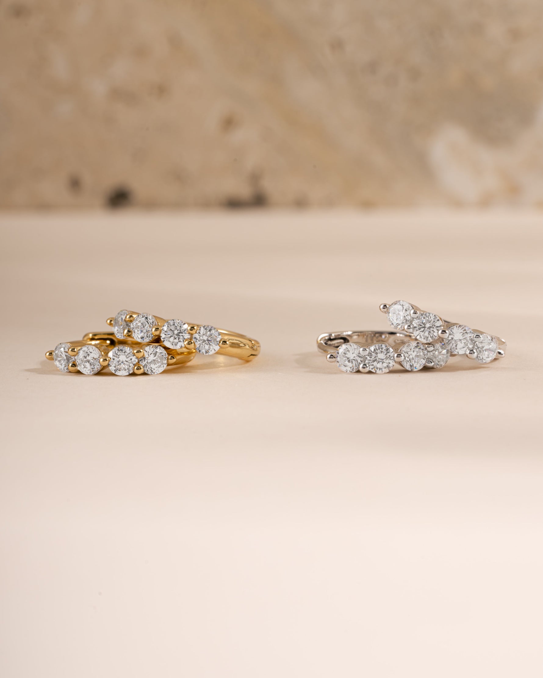 9mm gold and sterling silver Stacy Hoop Earrings by Sami Jewels featuring diamond accents in a huggie hoop style.
