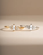 diamond marquise ring in gold and sterling silver side by side