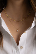 Sami Jewels Stacy Diamond Pendant Necklace featuring a sparkling diamond pendant on a delicate chain.