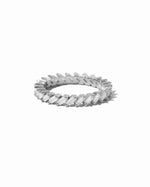 Slanted white cubic zirconia baguette ring by Sami Jewels featuring sterling silver band on a white background.