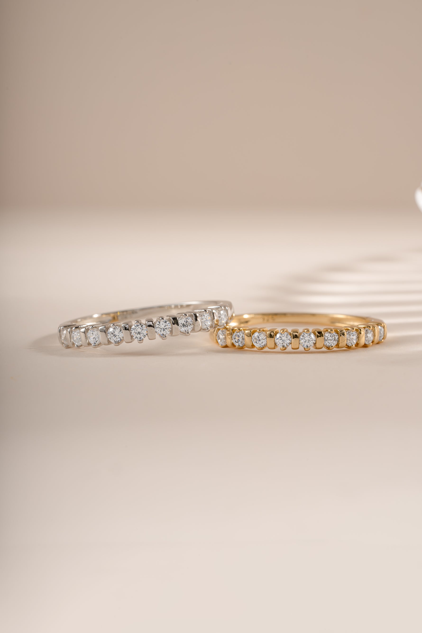 Sami Jewels Bianca stacking ring with gold and sterling silver, featuring a delicate diamond accent, front view.