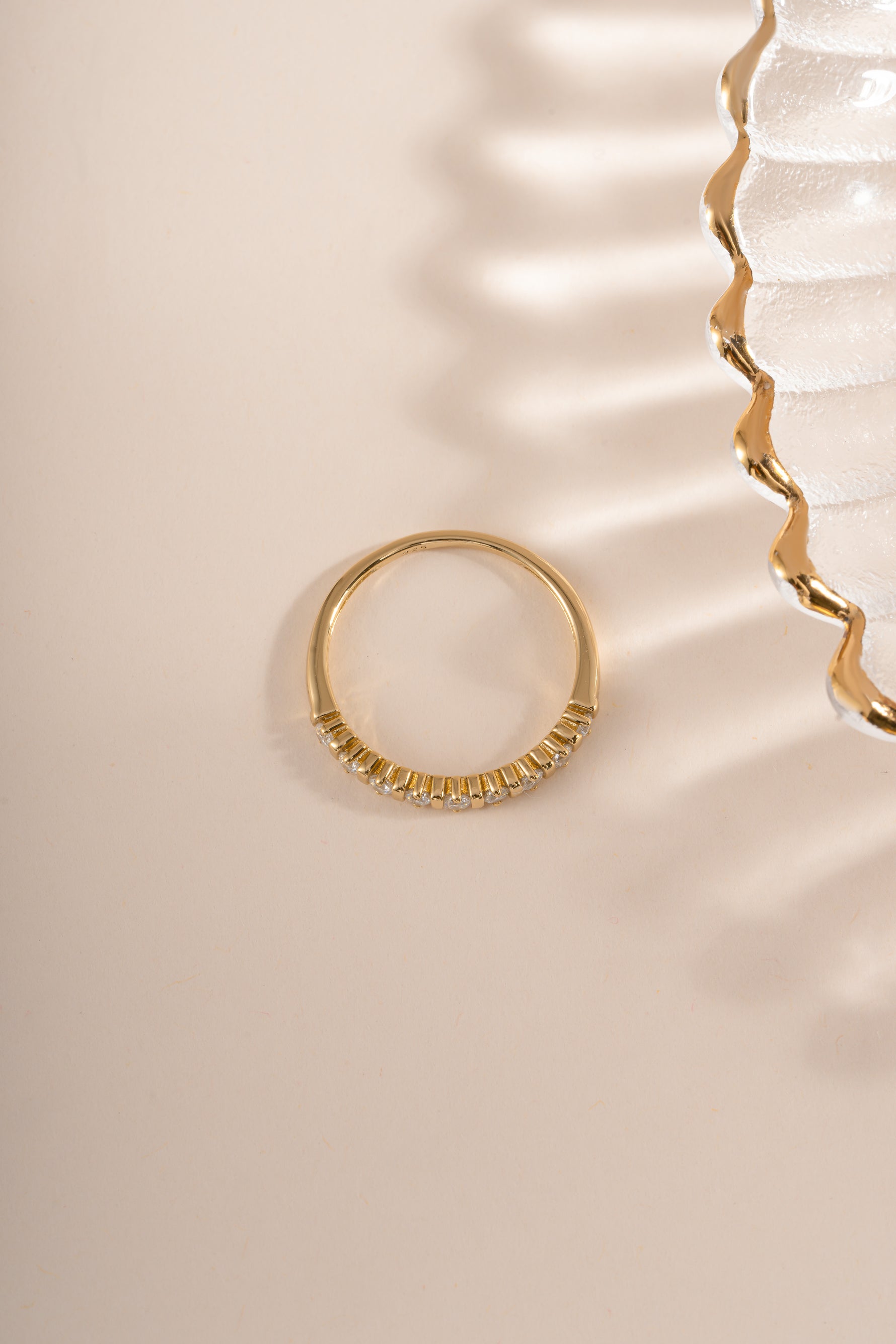 Gold Bianca stacking ring by Sami Jewels with diamond accents, shown from a top view highlighting its elegant design.