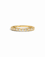 Sami Jewels Bianca stacking ring with gold band and diamond accents, displayed on a white background.