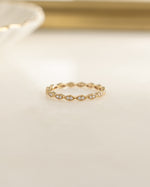 Gold diamond stacking ring from Sami Jewels featuring sparkling diamonds and a sleek, modern design.