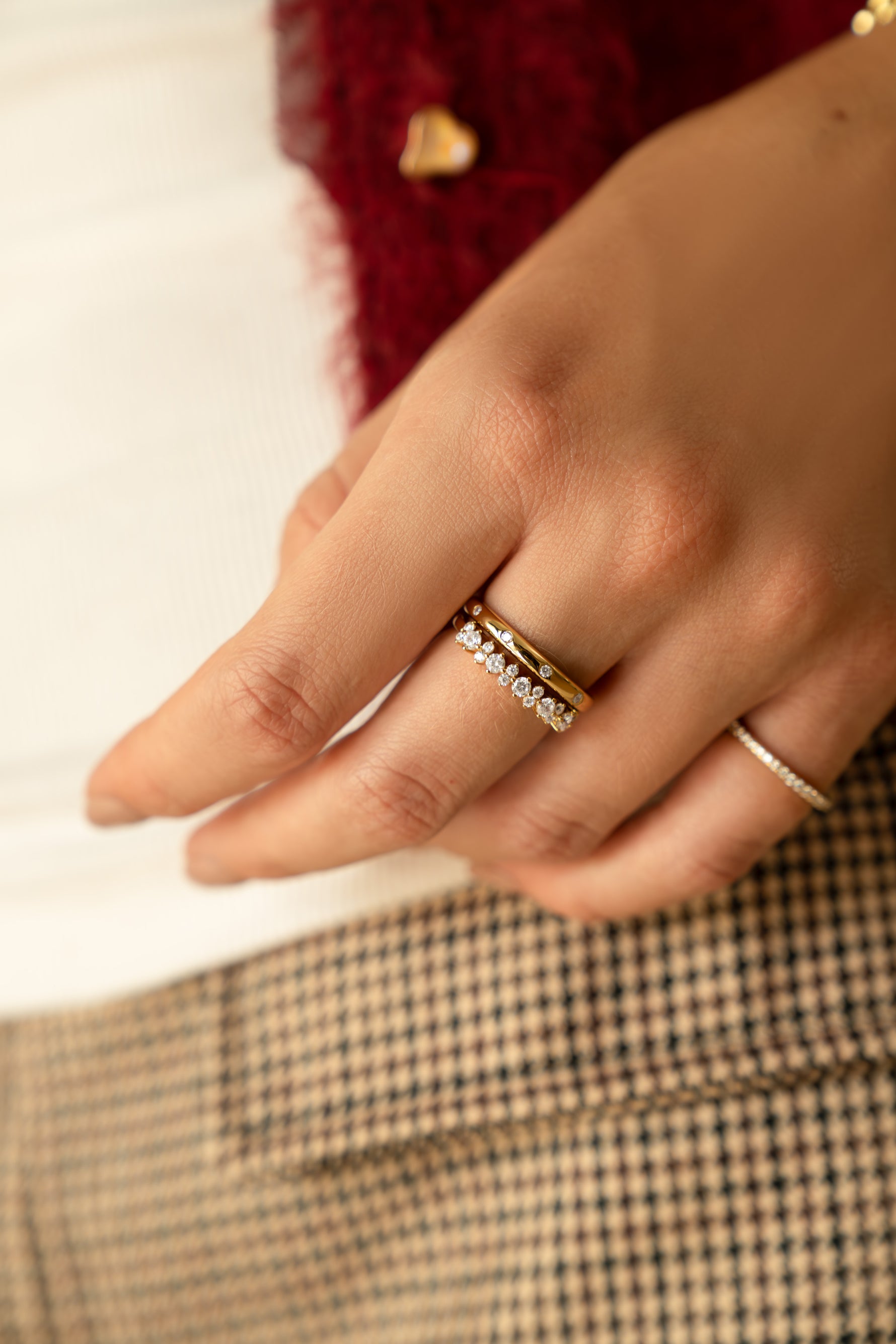 Gold stackable diamond multi-stone ring by Sami Jewels featuring sparkling diamonds on a sleek band.