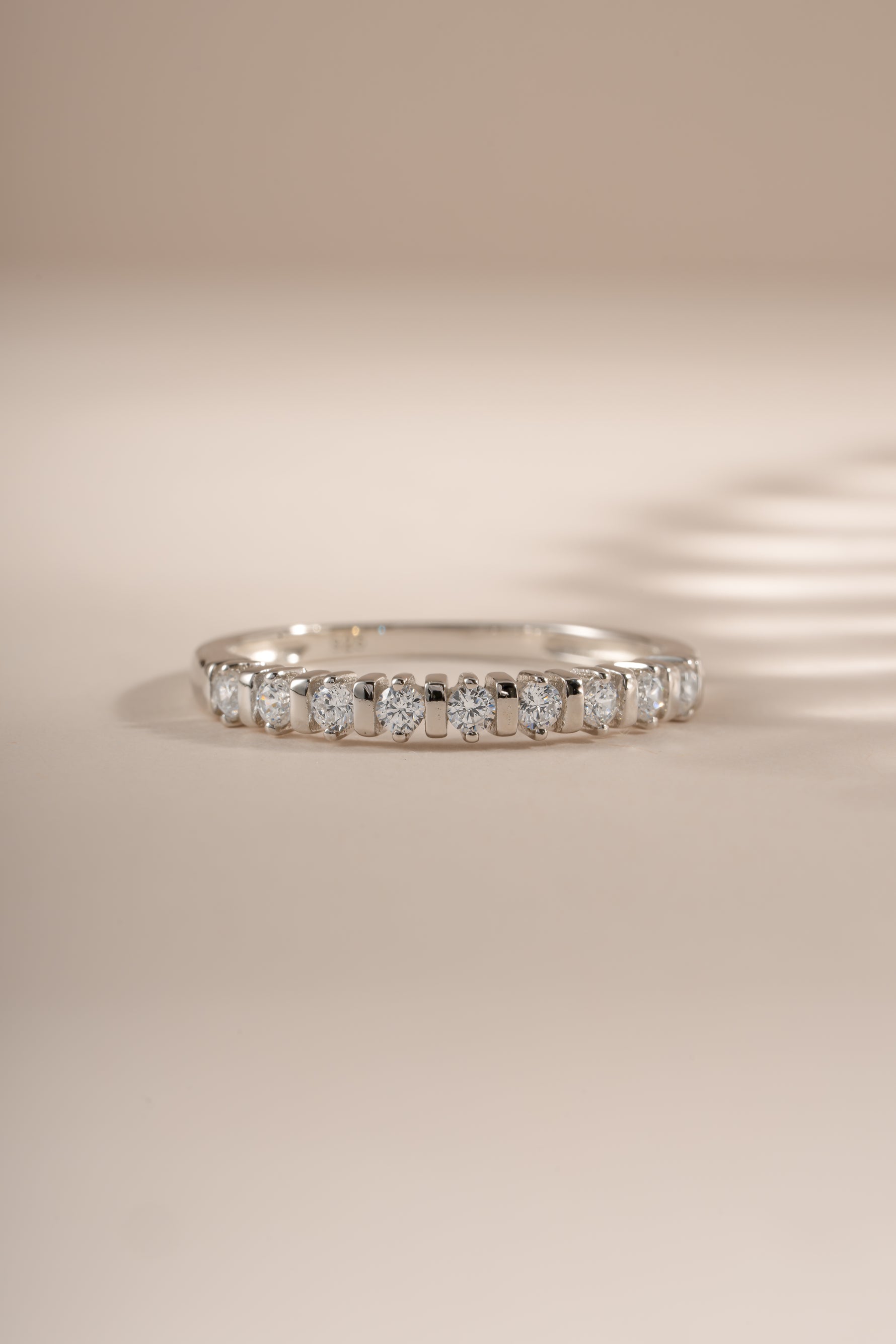 Sterling silver Bianca stacking ring with diamond accents by Sami Jewels, front view showing layered design and sparkling details.