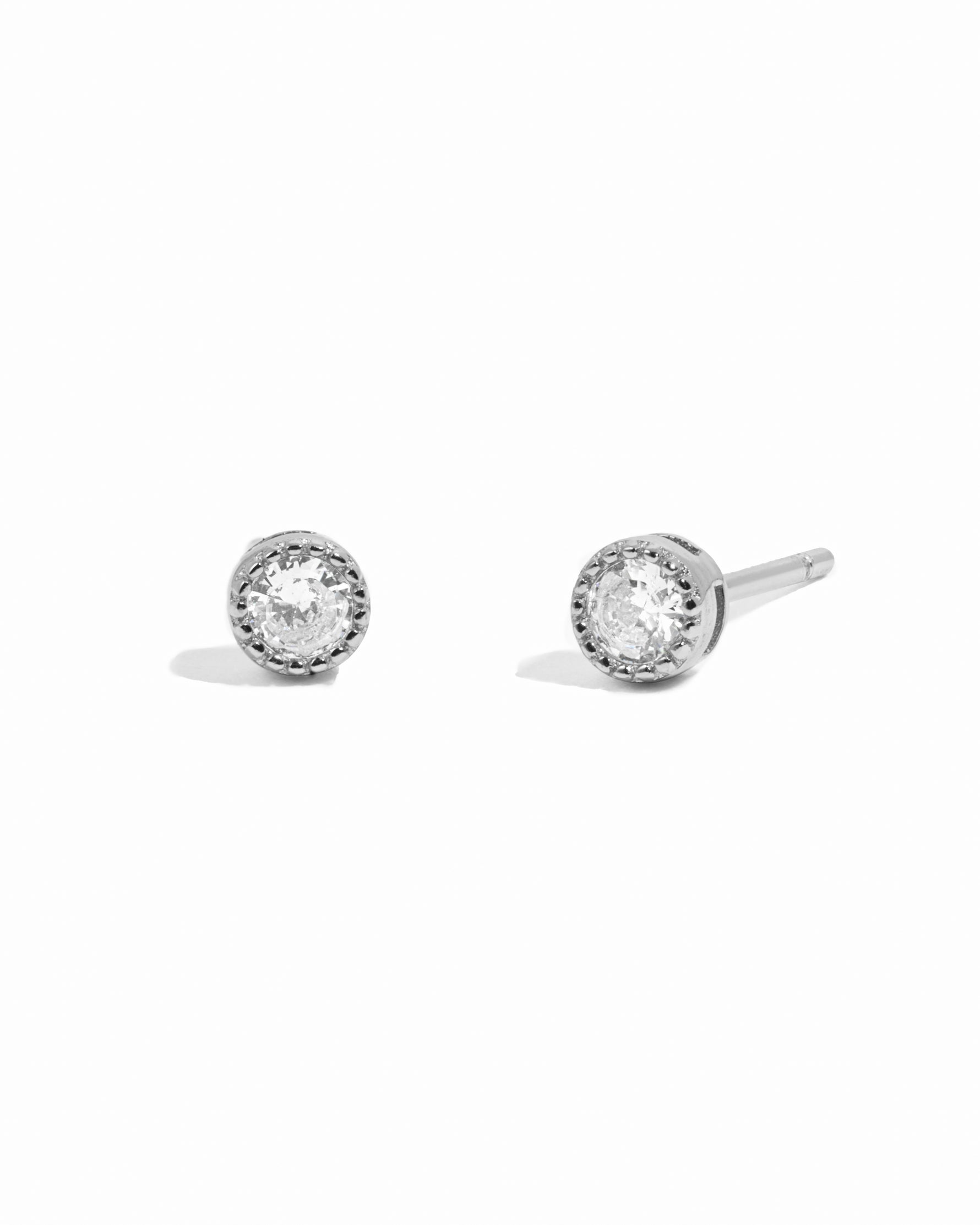 sterling silver diamond stud earrings white background