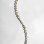 Close-up of a beaded bezel diamond bracelet made of cubic zirconia stones