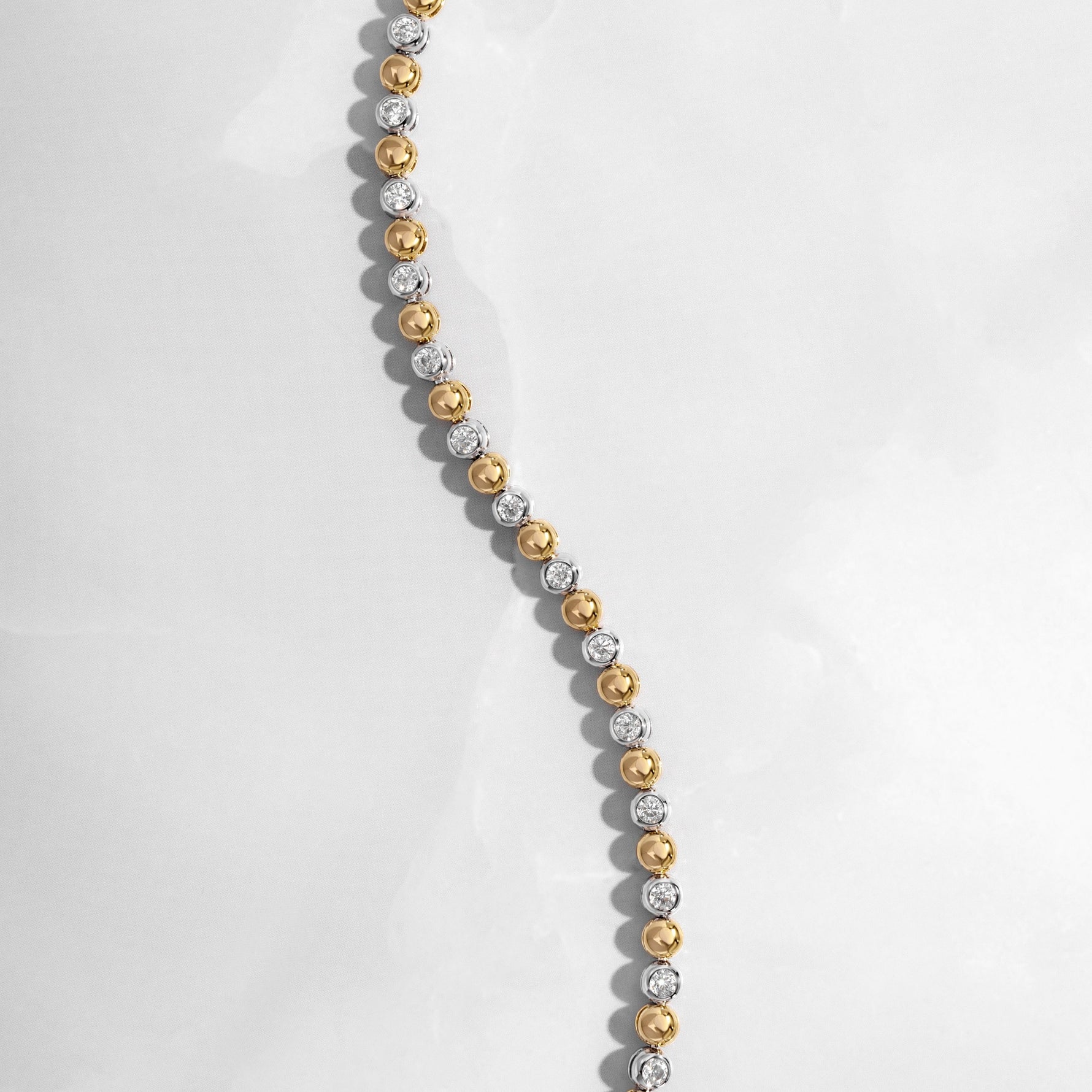 Close-up of a beaded bezel diamond bracelet made of cubic zirconia stones
