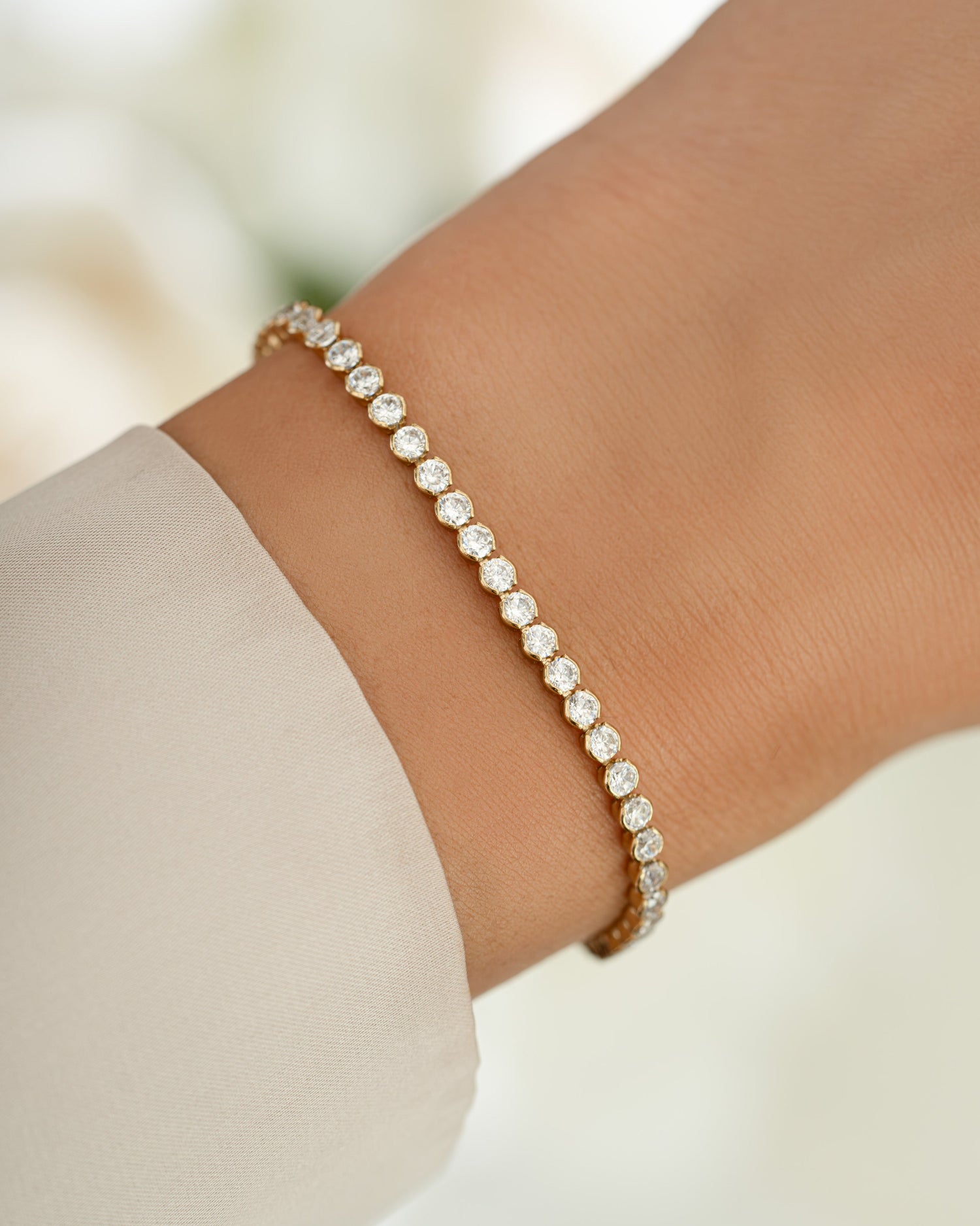 Gold 3mm round diamond tennis bracelet by Samijewels-527 featuring a sleek, elegant design with sparkling gemstones.