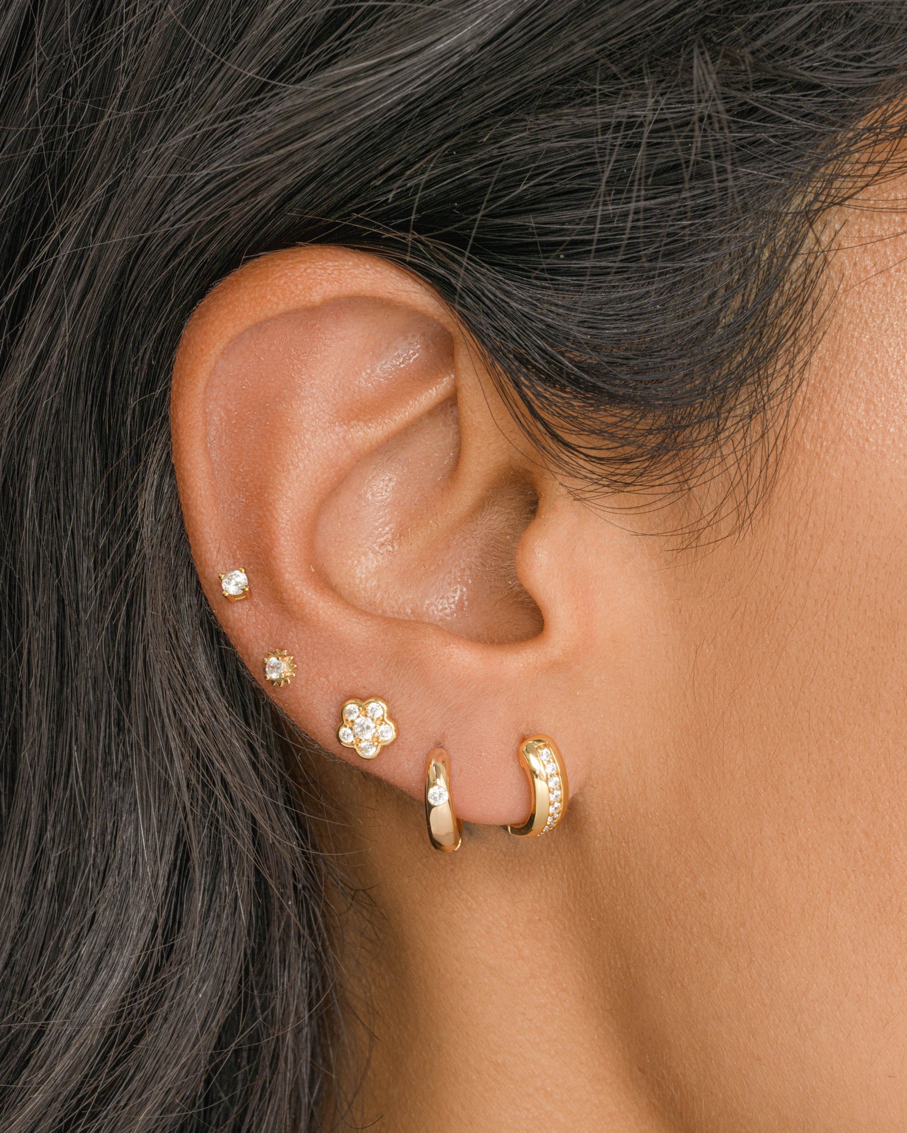 Gold Dome Diamond Huggie Earrings by Sami Jewels featuring small, rounded hoop design with embedded diamonds