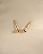 Gold Dot Stud Earrings by Sami Jewels, top view showing small circular stud design in shiny gold finish.