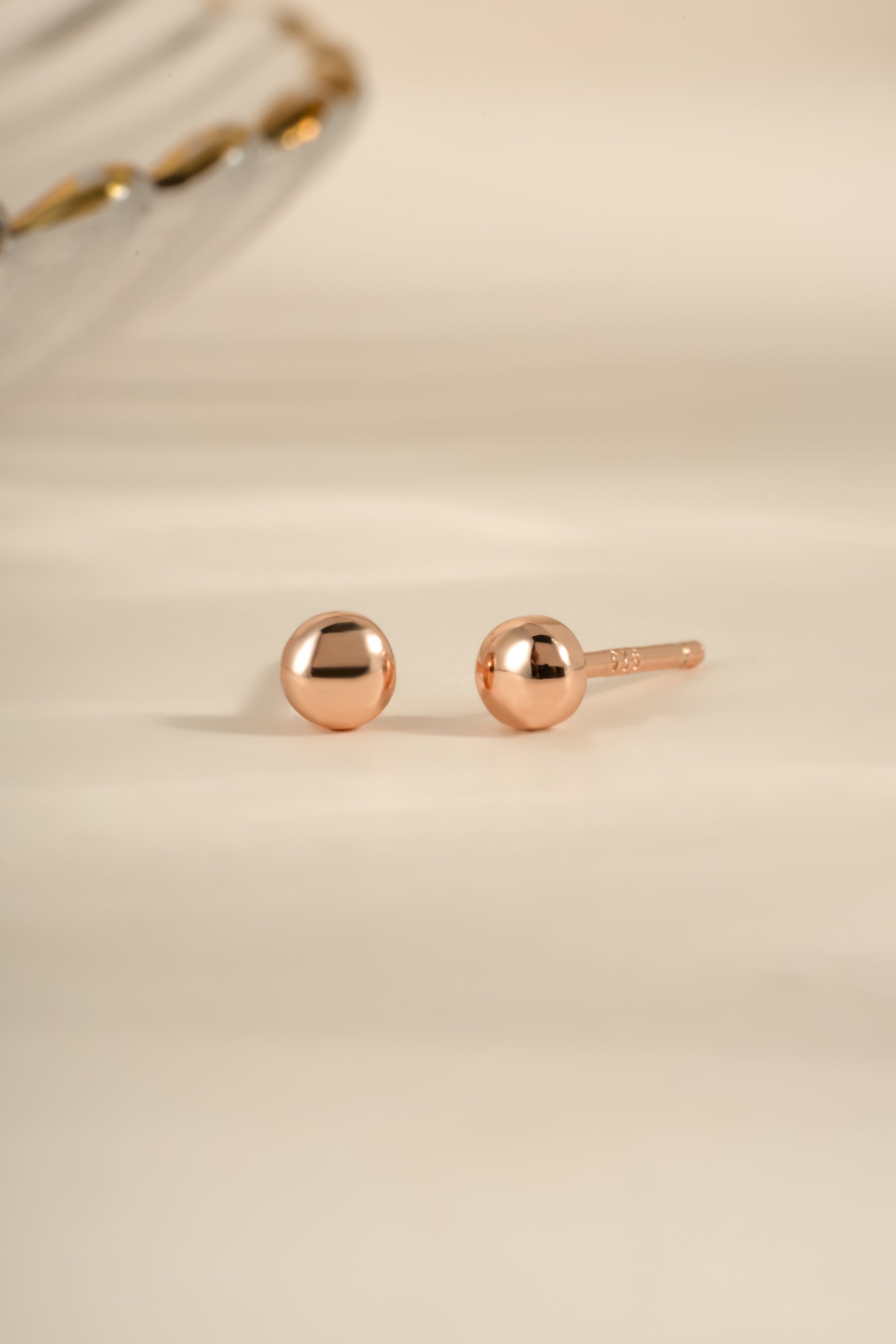 Rose gold Dot Stud Earrings by Sami Jewels featuring small, round stud design with a polished finish.