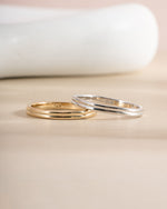 Gold and sterling silver double band ring by Sami Jewels, featuring sleek, layered design with polished finishes.