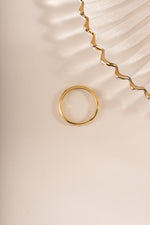 Sami Jewels Cathy gold double-band ring viewed from the top, showcasing its elegant design and polished finish.