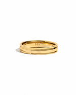 Gold Cathy ring by Sami Jewels featuring a double-band design on a white background.