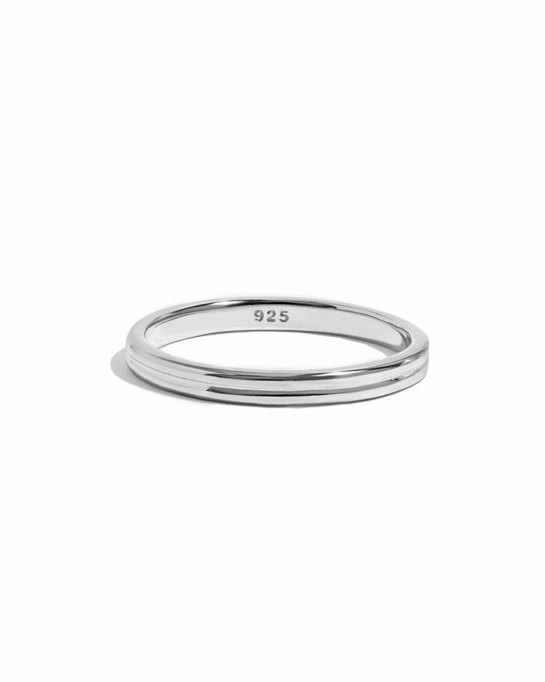 Sterling silver double band ring by Sami Jewels displayed against a white background.