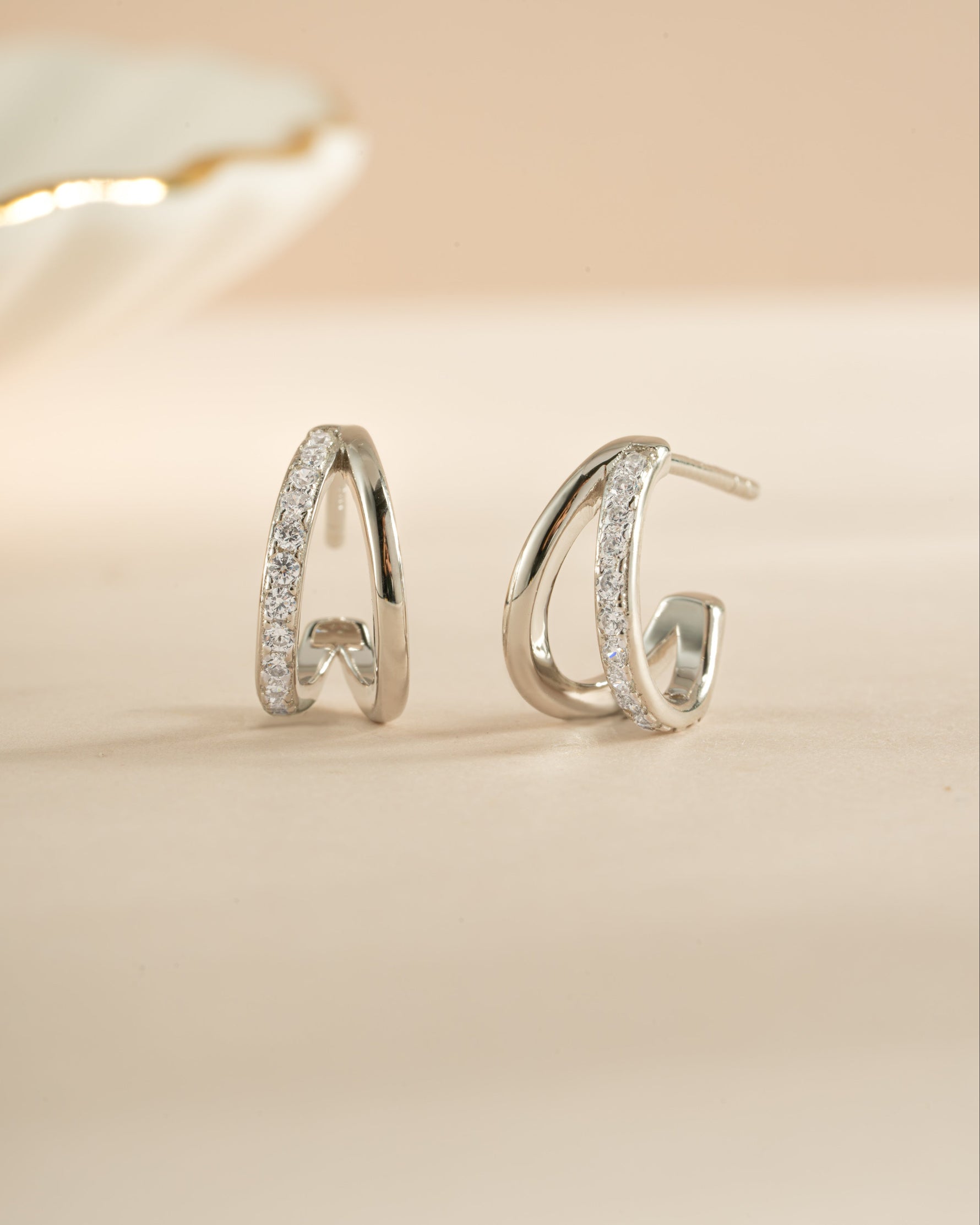 Sterling silver Double Diamond Hoop Earrings by Sami Jewels featuring two sparkling diamond-shaped charms.
