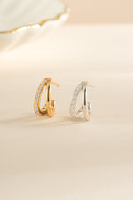 Gold and sterling silver double diamond hoop earrings by Sami Jewels featuring sleek, modern design.