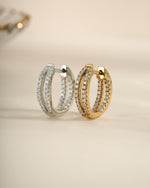 Gold and sterling silver double hoop earrings from Sami Jewels with a fun, playful design.