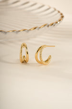Gold Stella Hoop Earrings by Sami Jewels, double hoop design, front view showcasing their elegant round shape and shiny finish.