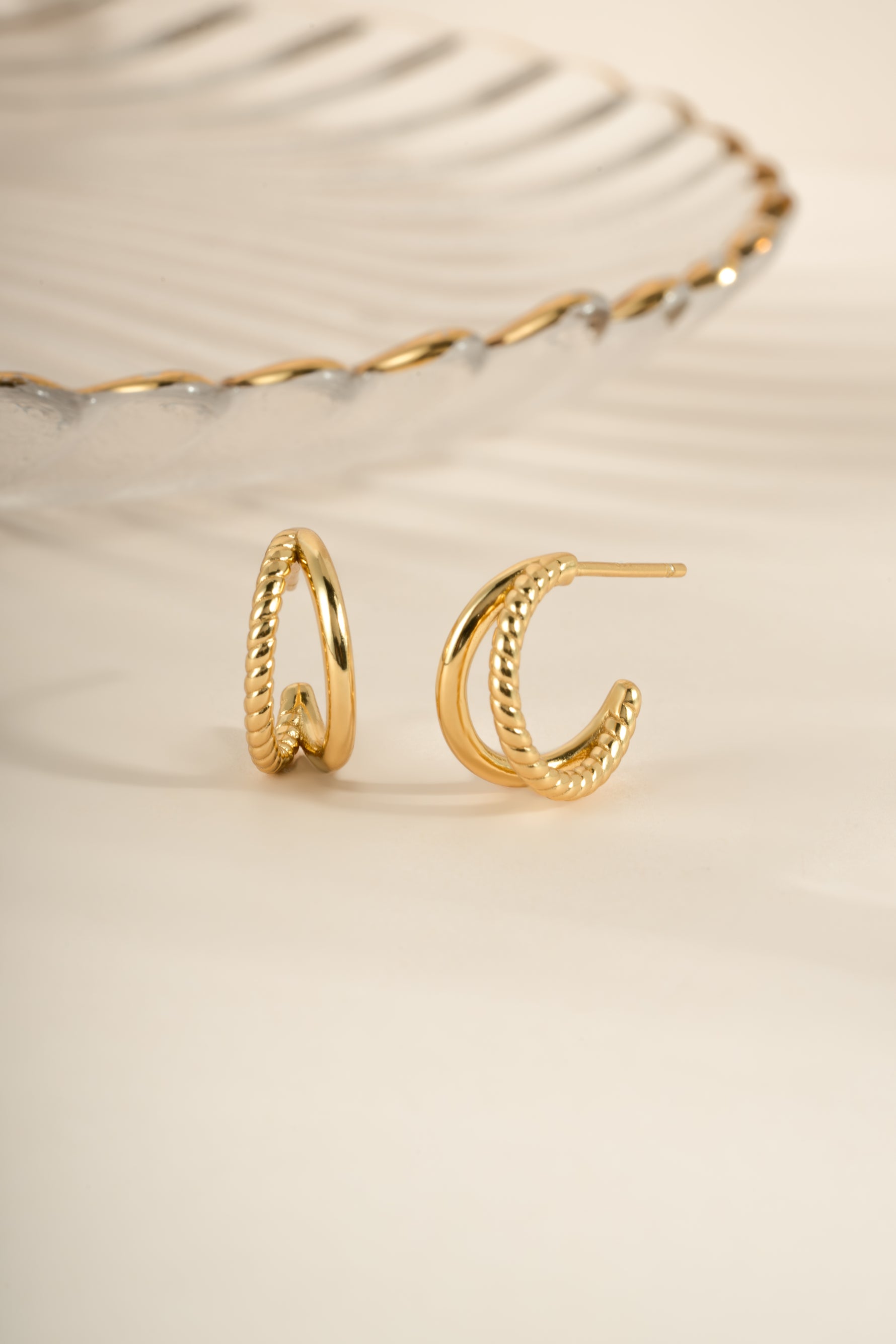 Gold Stella Hoop Earrings by Sami Jewels, double hoop design, front view showcasing their elegant round shape and shiny finish.
