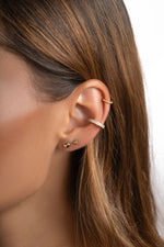 Gold double-row CZ ear cuff earrings by Sami Jewels, featuring sparkling cubic zirconia stones on a sleek, modern design.