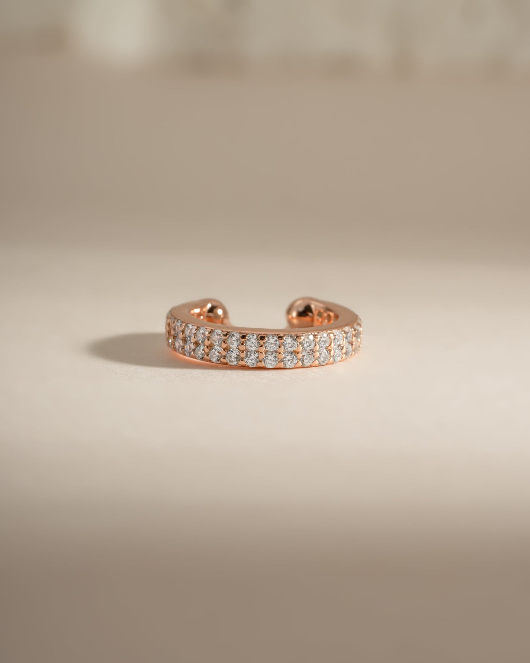 Rose gold double row CZ ear cuff earrings by Sami Jewels featuring sparkling cubic zirconia stones.