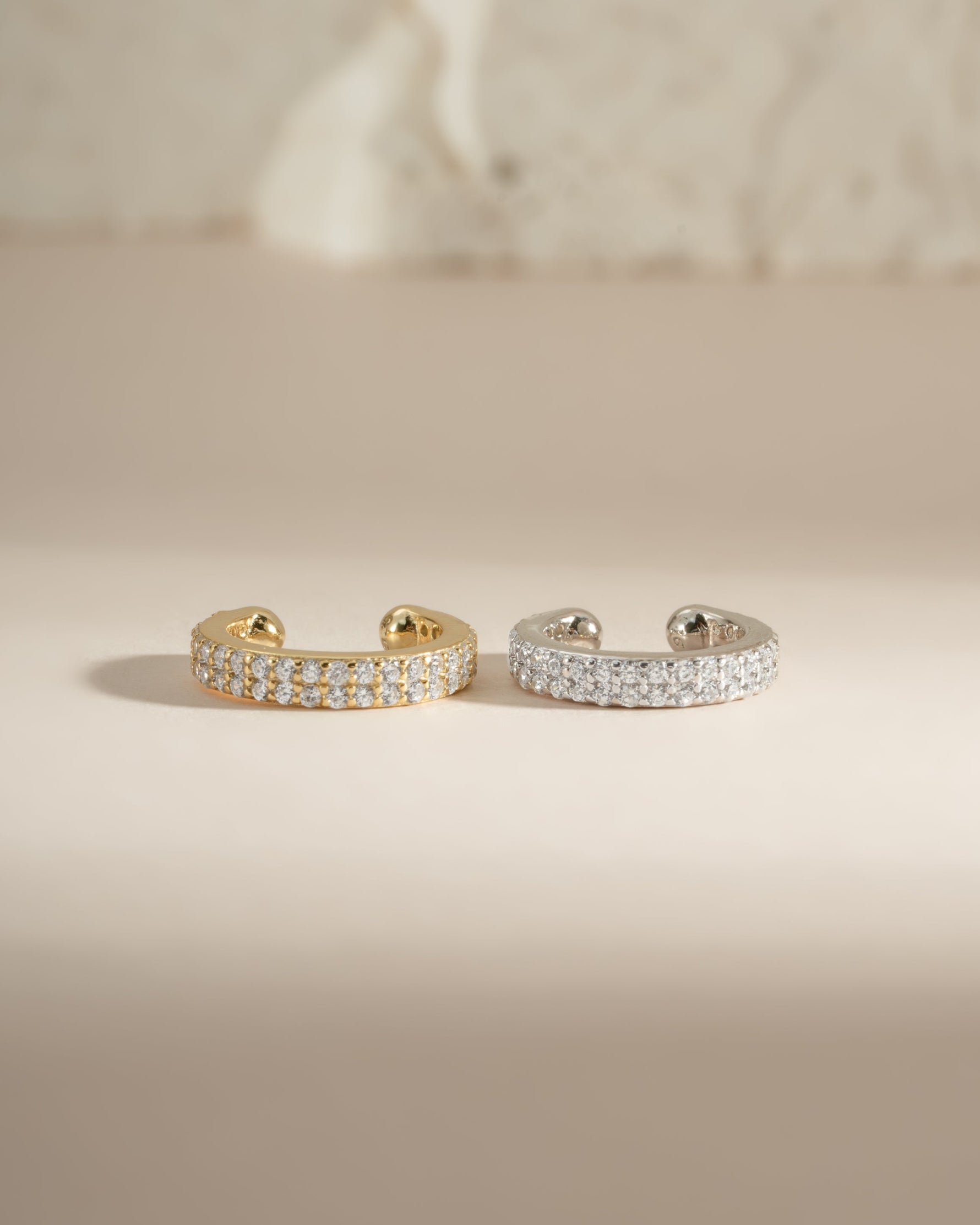 Sami Jewels double row CZ ear cuff earrings in sterling silver and gold, featuring sparkling cubic zirconia stones.