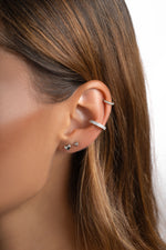 Sterling silver double row CZ ear cuff earrings by Sami Jewels with sparkling cubic zirconia accents.