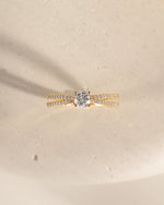 double shank diamond ring in gold top view closeup