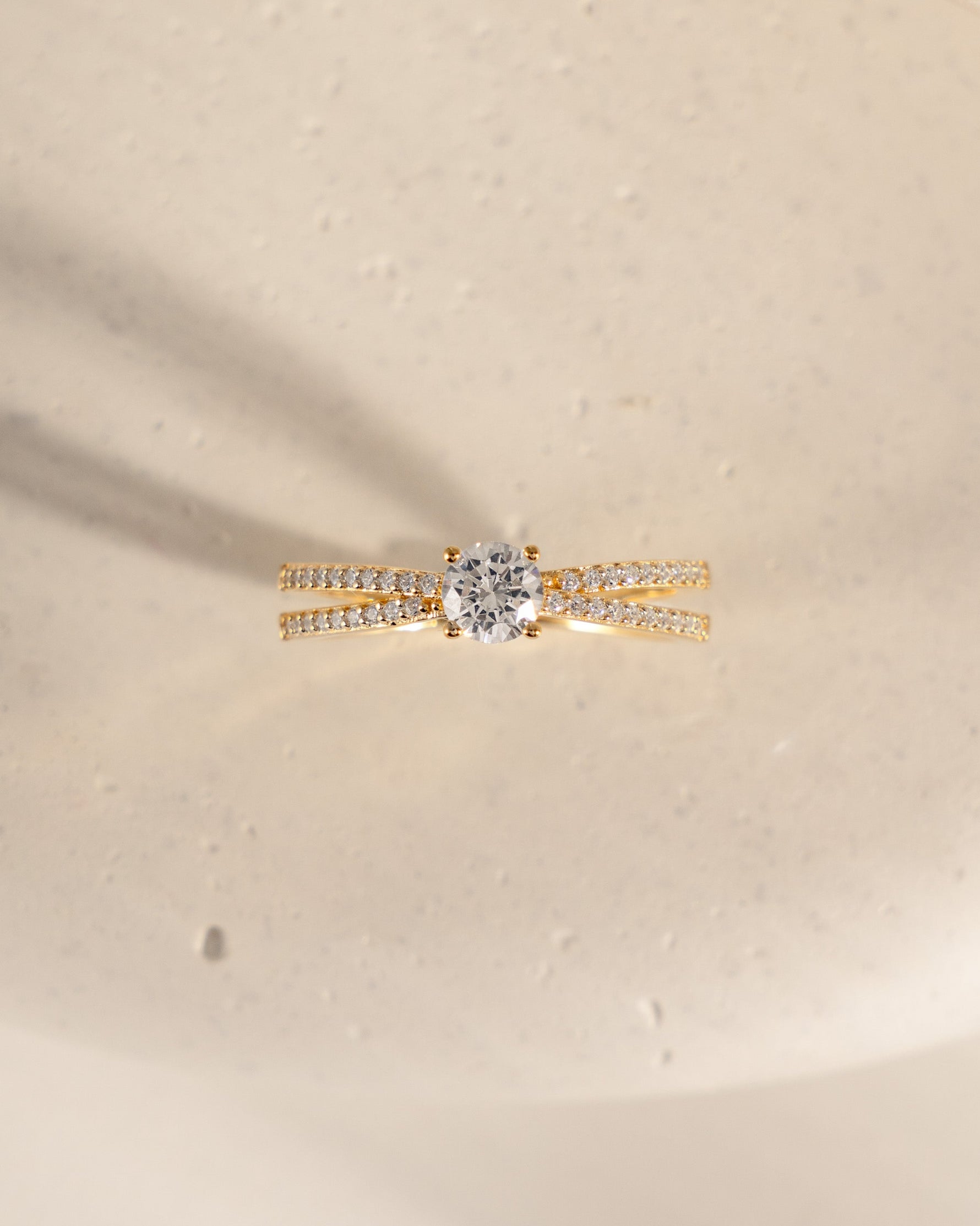 double shank diamond ring in gold top view closeup