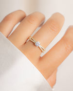 double shank diamond ring in gold on models hand