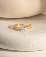 double shank diamond ring in gold closeup