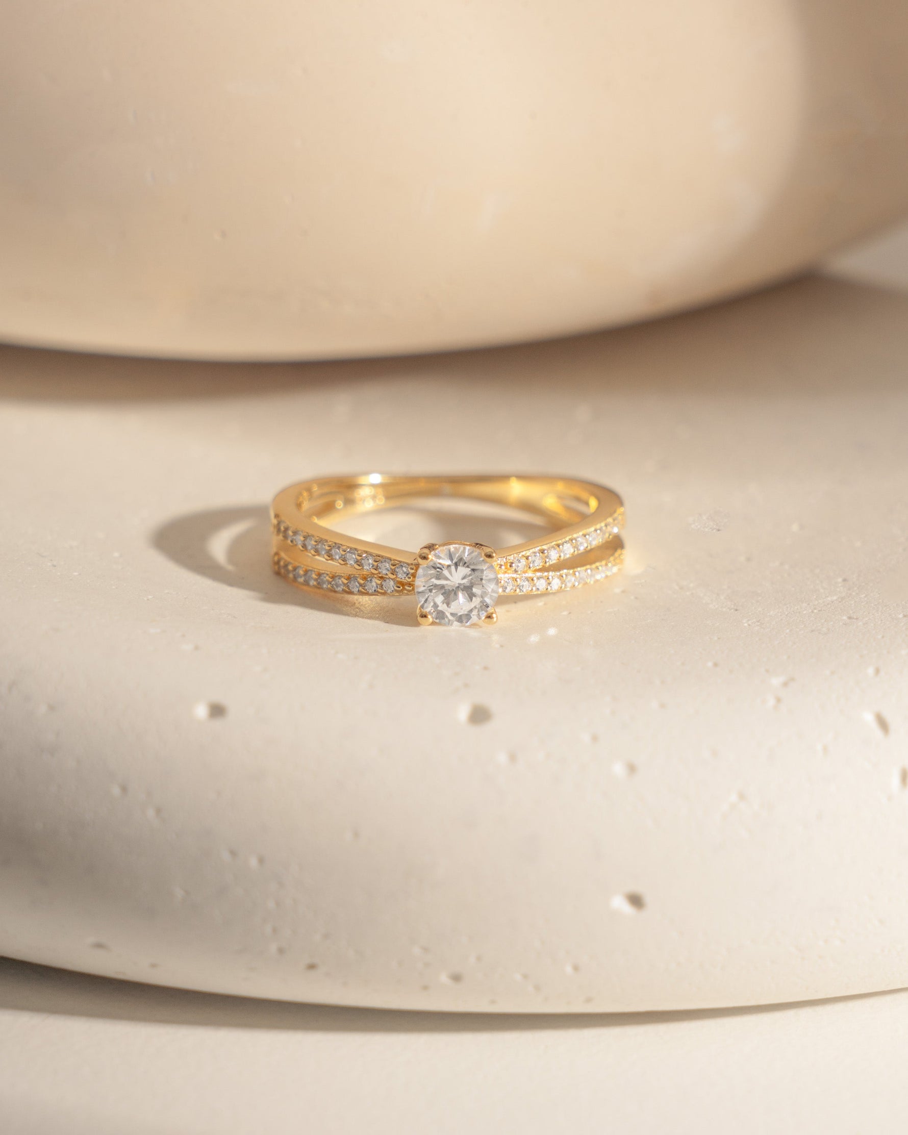 double shank diamond ring in gold closeup