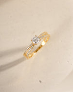 double shank diamond ring in gold closeup of cubic zirconia stone 