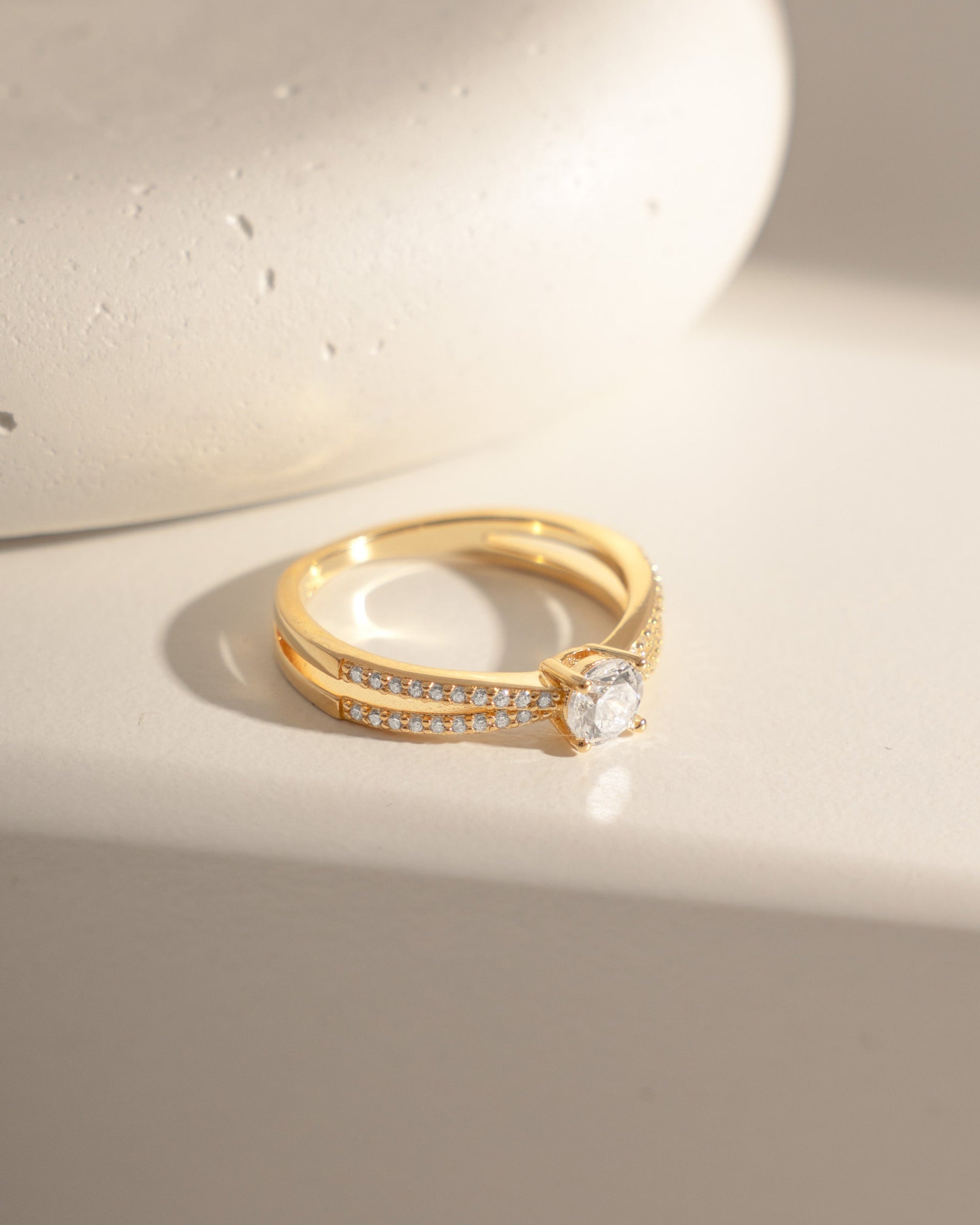 double shank diamond ring in gold side view 