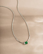 Emerald baguette bezel statement necklace by Samijewels-527 featuring a sterling silver chain and vibrant emerald gemstones.