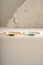Sterling silver and gold Emerald Baguette Ring featuring a vibrant emerald gemstone set in an elegant ring design.