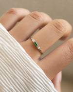 Sterling silver Emerald Baguette Ring by Sami Jewels featuring a vibrant emerald gemstone and sleek design.
