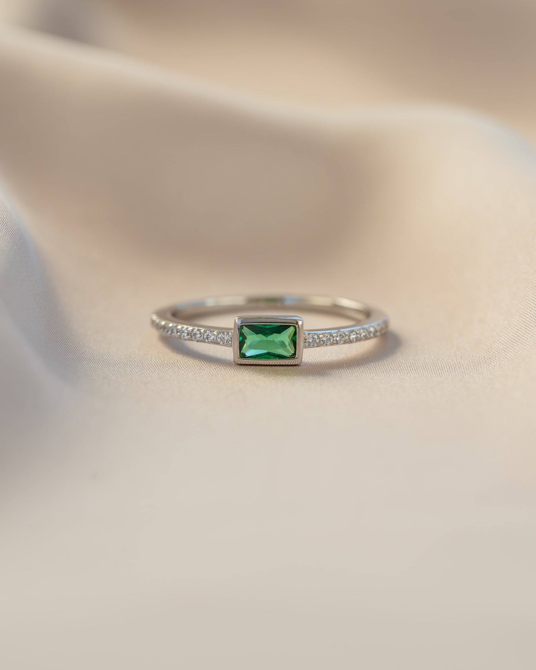 emerald baguette ring with pave band in sterling silver