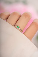 Sterling silver Emerald Cushion Ring by Sami Jewels featuring a vibrant green cushion-cut emerald gemstone.