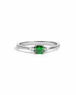 Sterling silver emerald cushion ring by Sami Jewels featuring a vibrant green emerald gemstone on a clean white background.