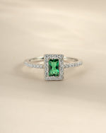 Close-up of Sami Jewels Emerald CZ ring featuring an emerald-cut green cubic zirconia set in sterling silver.