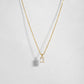 gold diamond emerald cut necklace