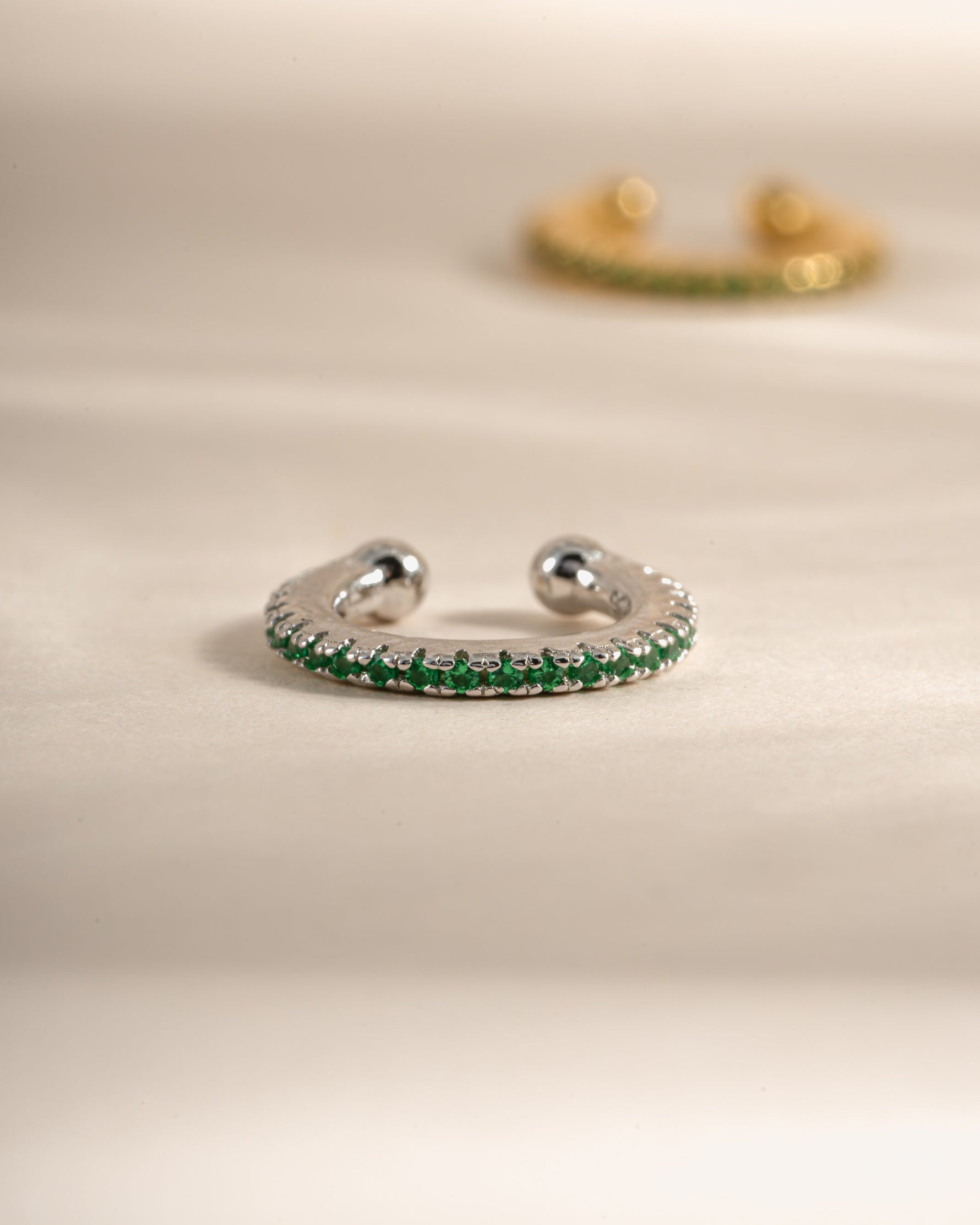 emerald ear cuff earring in sterling silver closeup view