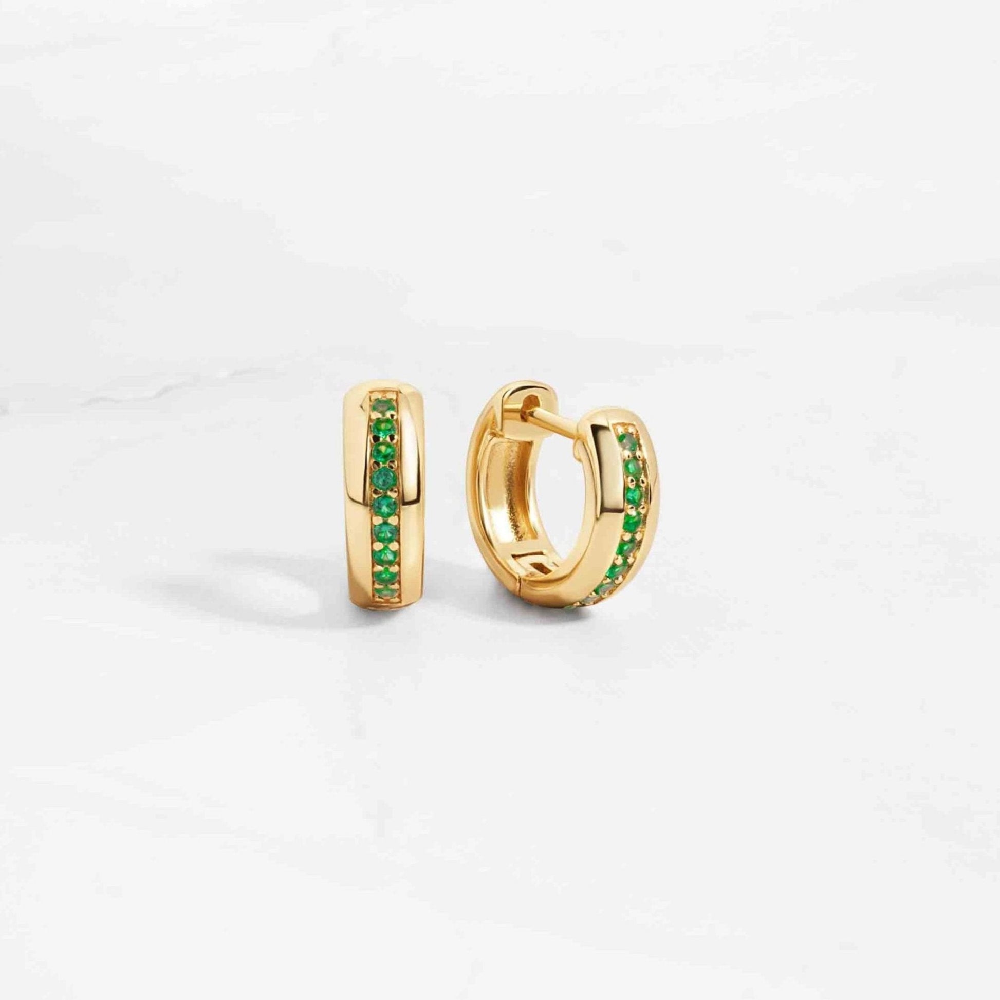 minimalist gold hoop earrings with emerald stones