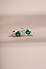 emerald three stone huggie hoop earring in sterling silver 